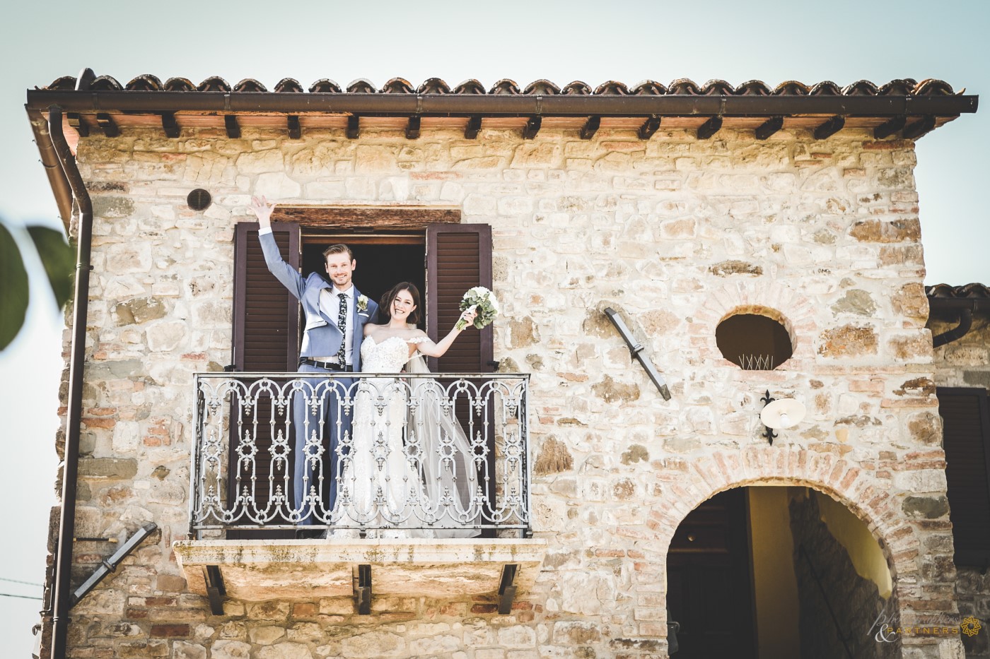 Waving from the balcony