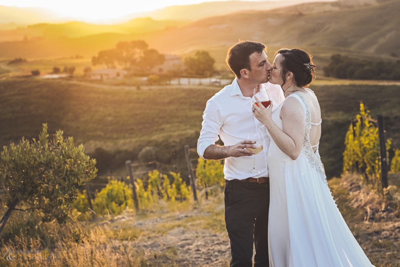 Romantic kiss at sunset